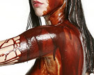 Woman covered in chocolate