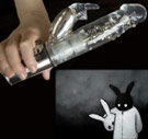 A moment of motionless silence please, for the deceased vibrator. Rabbit vibrator and costumed rabbit holding dead rabbit head