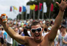 Drunk shirtless guy with a beer