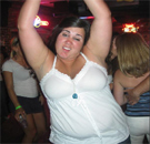 It's like a threesome... for two. Fat chick dancing in the bar with her hands up