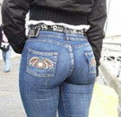Girl with a big butt in tight blue jeans