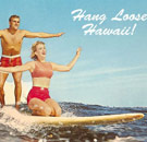 It feels so emasculating, right honey?! Man and woman on a surfboard in Hawaii