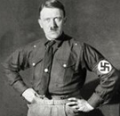 If nothing else, a svelte physique to admire. Herr Hitler posing with hands on his hips