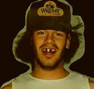 Hmm, what's missing here...? Hick guy with wife beater and missing teeth