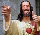 I did it all for you, kid! Write on! Buddy Jesus statue with a heart and a wink