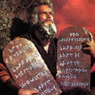 Moses holding letters from God