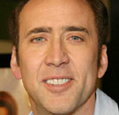 The definition of mixed emotion. Nicholas Cage with a smile and big forehead