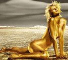 Paris Hilton in golden paint for champagne ad