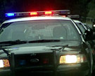 The jakes are coming, the jakes are coming! Police car with lights on