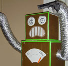 Killer cardboard robot with a gun