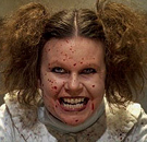 Scary girl with blood on her face