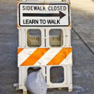 Sidewalk Closed, Learn to Walk (folding sign)