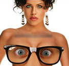 Supermodel with geek glasses over her nipples
