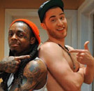 Lil Wayne and rapper pointing at each other