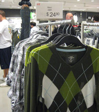 H&M's new Temptation section Argyle sweaters on clothes rack at H&M