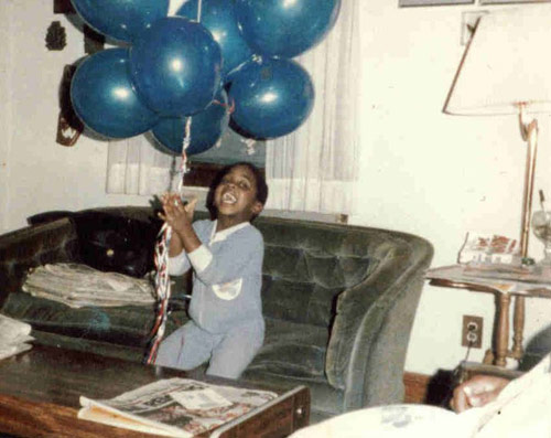 Baby Marcus Terry with blue balloons