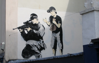 Banksy sniper with child art