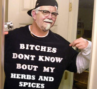 Colonel Sander with a tshirt on that says 'Bitches don't know bout my herbs and spices'