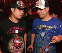 Two guys in Ed Hardy tshirts