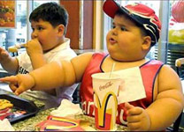Fat boy eating at McDonald's
