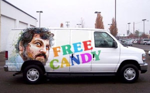 Free candy sign on a white van with sketchy guy pedophile