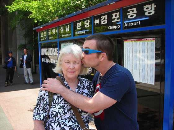 Goodbye Mom - airport kiss