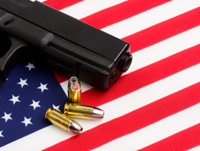 Gun, bullets and American flag