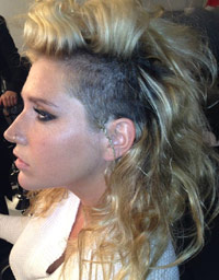 Kesha with half-shaved, half-long hair