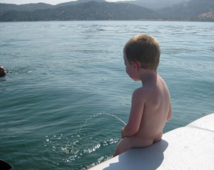 Kid pee in a lake