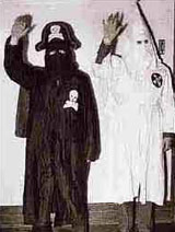 KKK man and black woman waving together