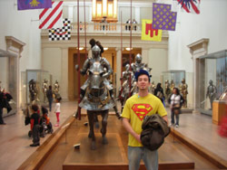 Lil Bot in the museum with knights in armor