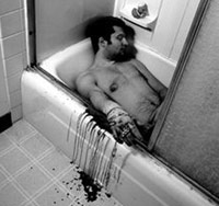 Man slit his wrists to commit suicide in a bathtub