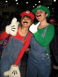 Girls dressed as Mario and Luigi characters