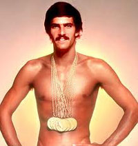 Michael Phelps wearing gold medals