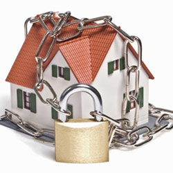 House wrapped in chains and padlock