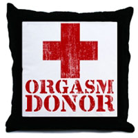 Orgasm Donor label and Red Cross sign on a pillow
