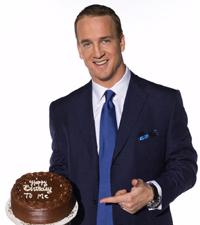 Peyton Manning holds his birthday cake