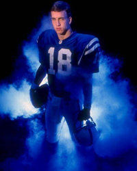 Peyton Manning enters the field in a cloud of smoke
