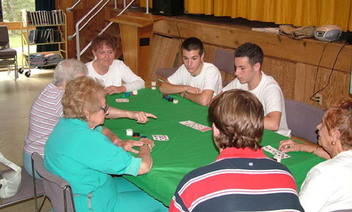 Poker room with old people and a couple of college students