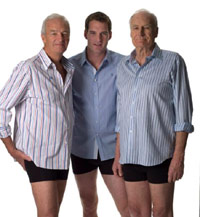 Three older men in boxers and button up shirts