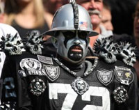Raiders fan in S&M costume