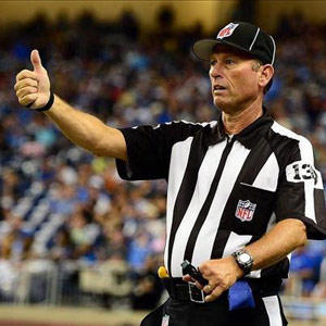 Replacement NFL referee giving a thumbs up sign