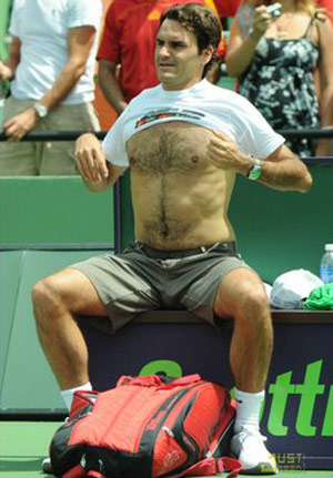Roger Federer shirtless on tennis court