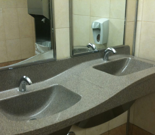 Sloping sink in a public restroom