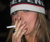 Slutty girl smoking a cigarette