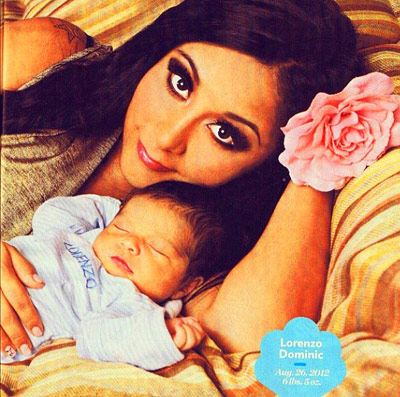 Snooki holding a baby