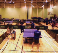 Table tennis club matches in a gym