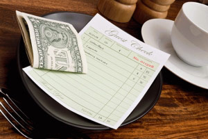 Server tip money on the table
