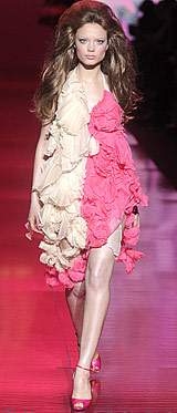 Ugly pink and white dress on a model on the runway