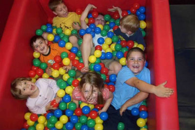 Ball pit with kids in it